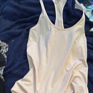 Lululemon Light Cream Racerback Tank new without tags!! Price is negotiable!!!
